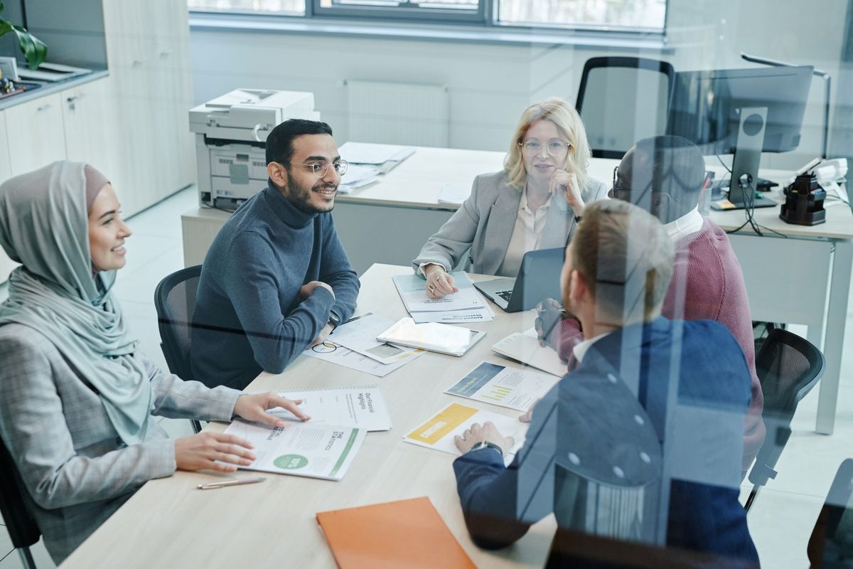 A leadership team reviewing a technology roadmap in a boardroom